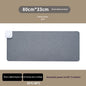 Gray heated desk mat, 31 x 13 in, touch display controls (variant photo)